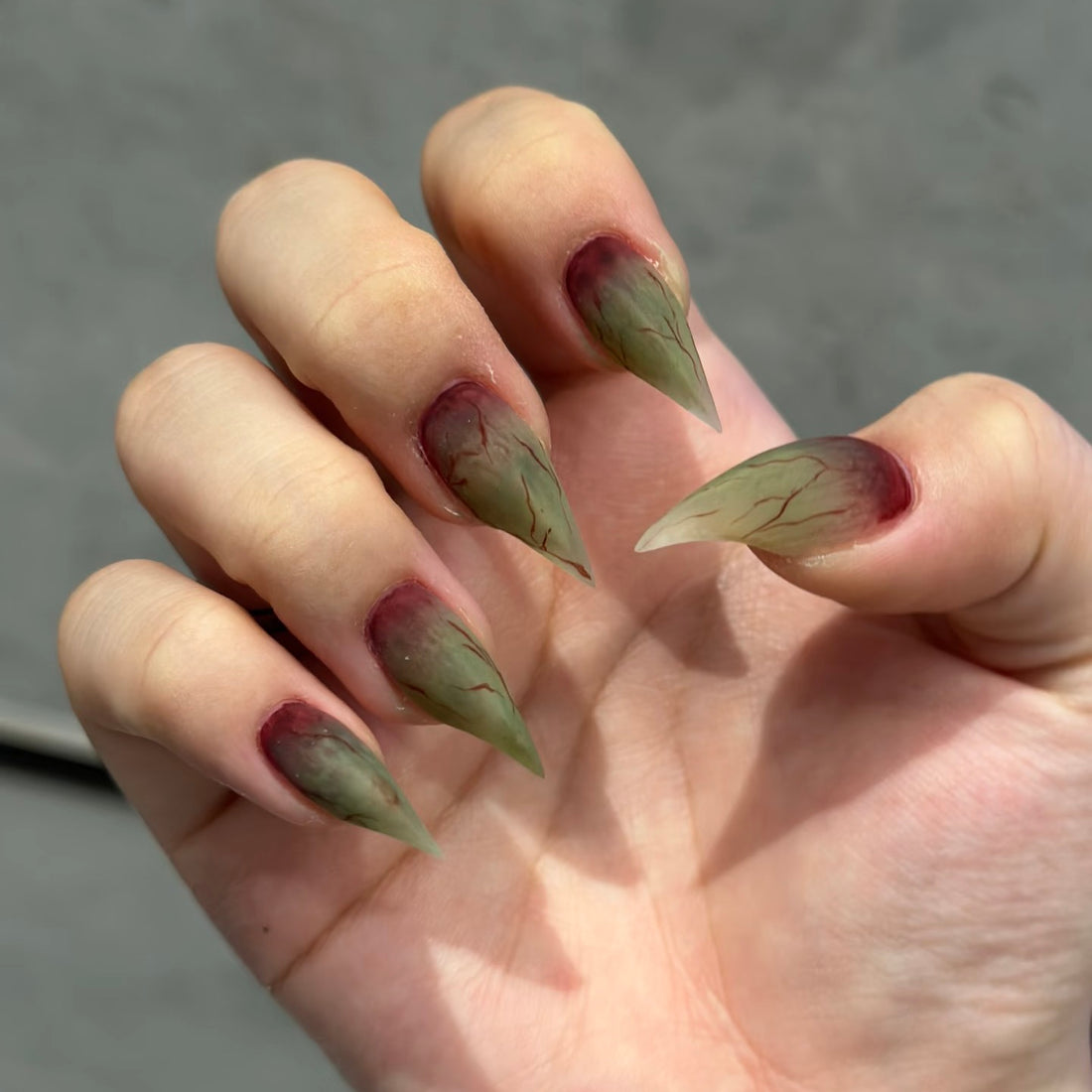 HexClaw | Bruised claw nails, blue-purple gradient bruised nails, acrylic press on nails, claw press on nails, cosplay nails, pain-inspired nails, claw gloves, halloween nails